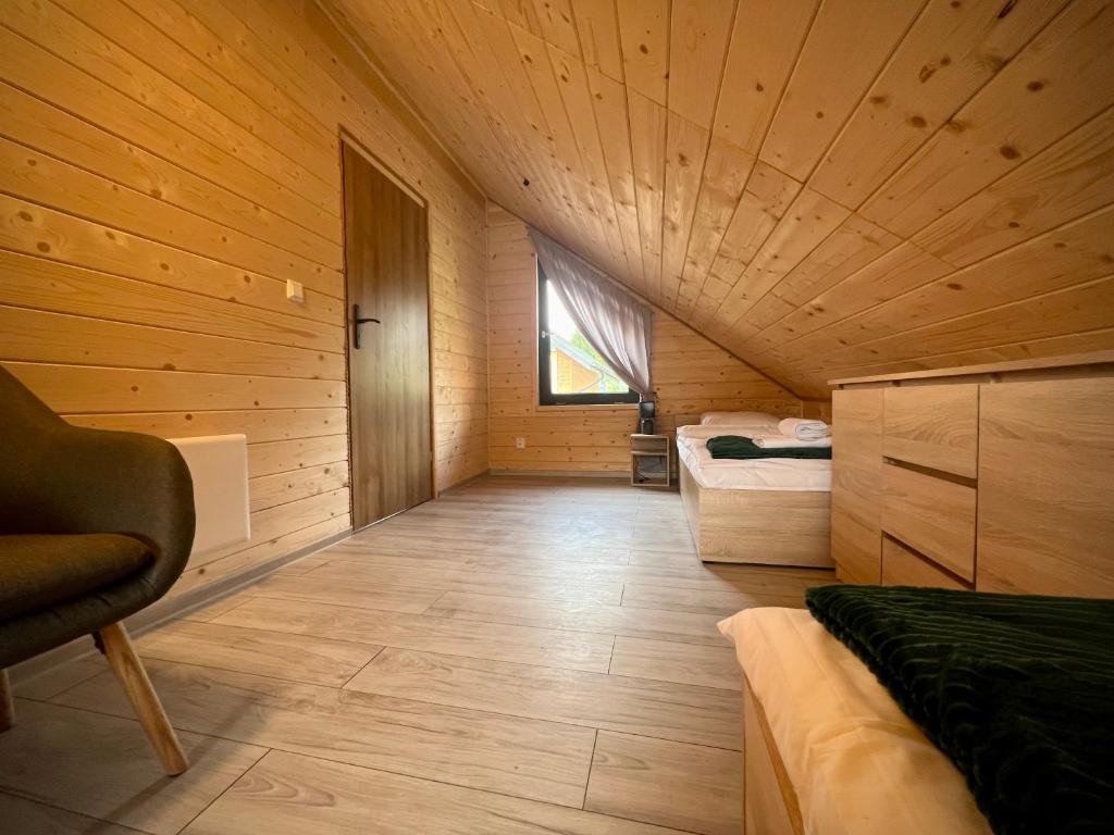 Postel nebo postele na pokoji v ubytování Barka Bieszczady