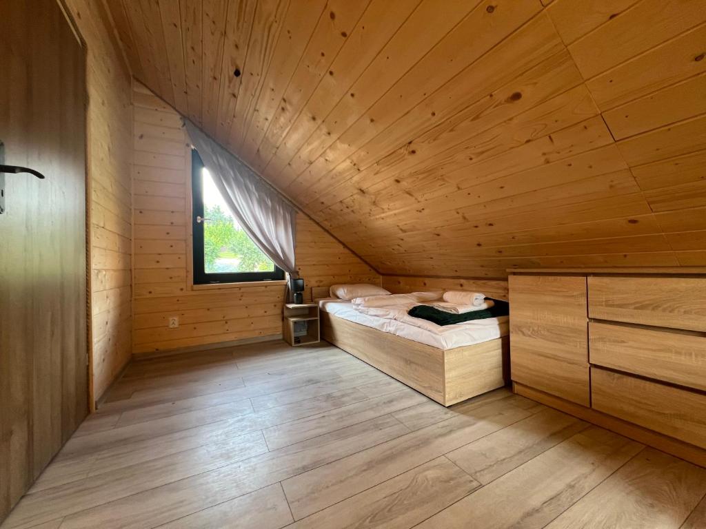 Postel nebo postele na pokoji v ubytování Barka Bieszczady