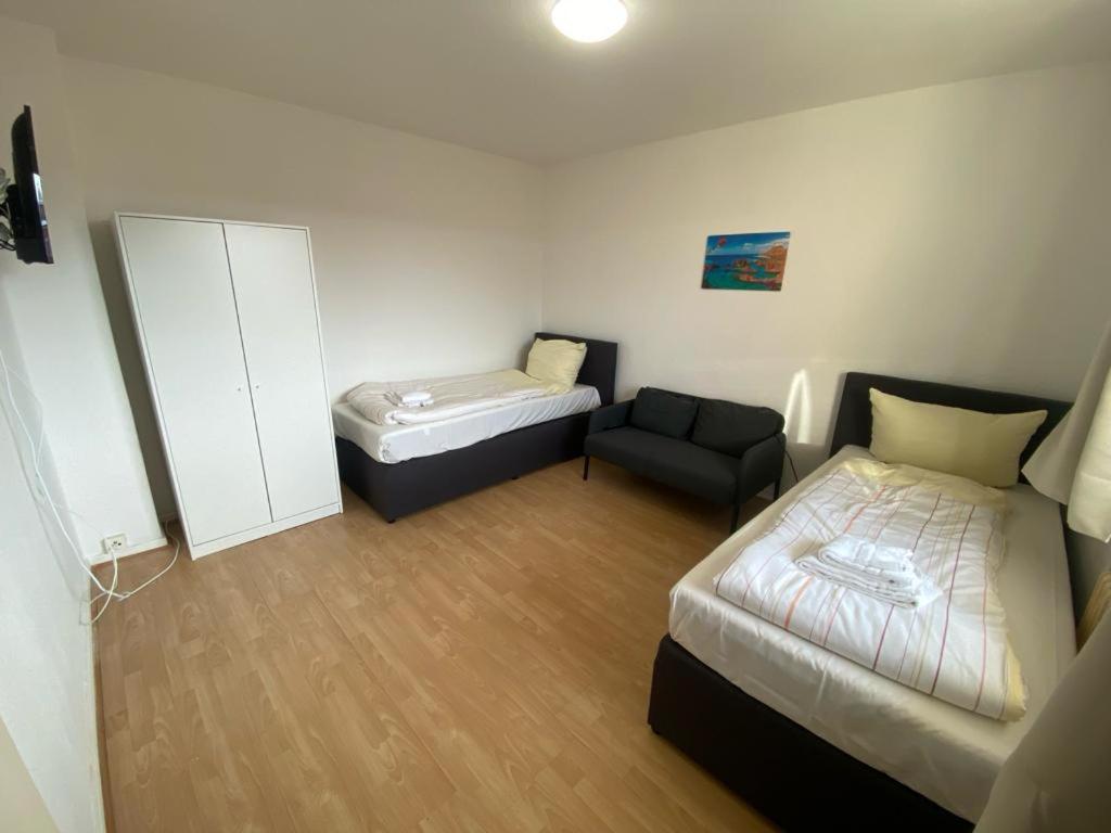 City Apartments in Neumünster - Ruhige Lage mit bester Anbindung - Apartamento De Dos Dormitorios Con Balcón