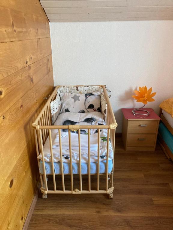 Postel nebo postele na pokoji v ubytování Haus Dorfblick