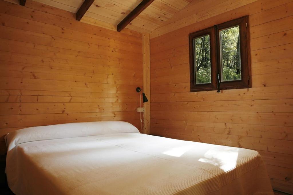 Postel nebo postele na pokoji v ubytování Camping Maçanet de Cabrenys