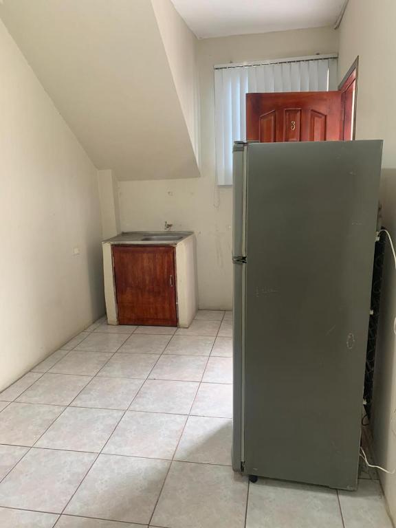 Kuchyň nebo kuchyňský kout v ubytování Habitaciones amobladas - Manabí suites