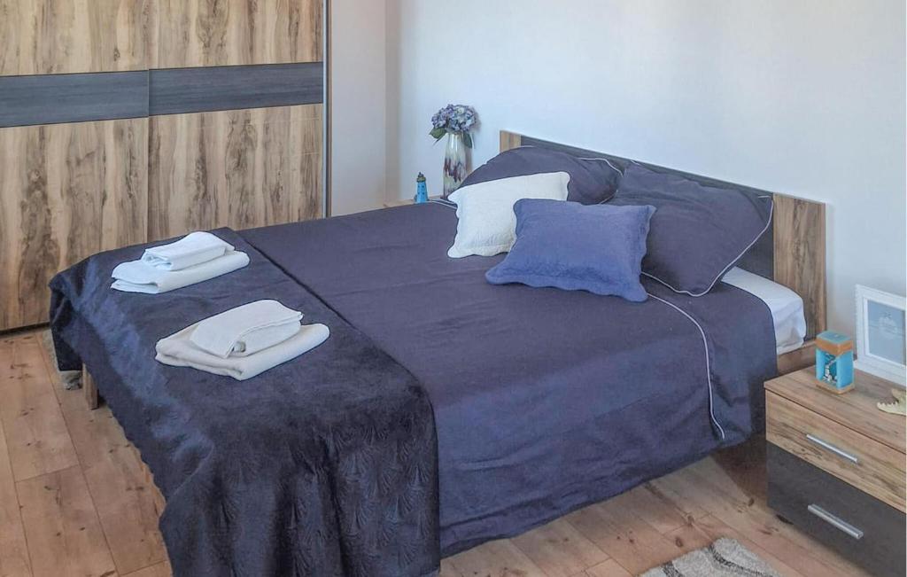 Posteľ alebo postele v izbe v ubytovaní Three-Bedroom Holiday Home In Novigrad