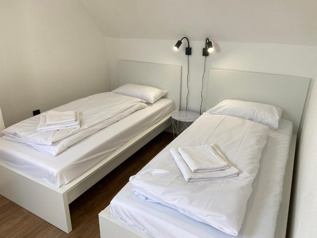 Postel nebo postele na pokoji v ubytování M3-Apartmány