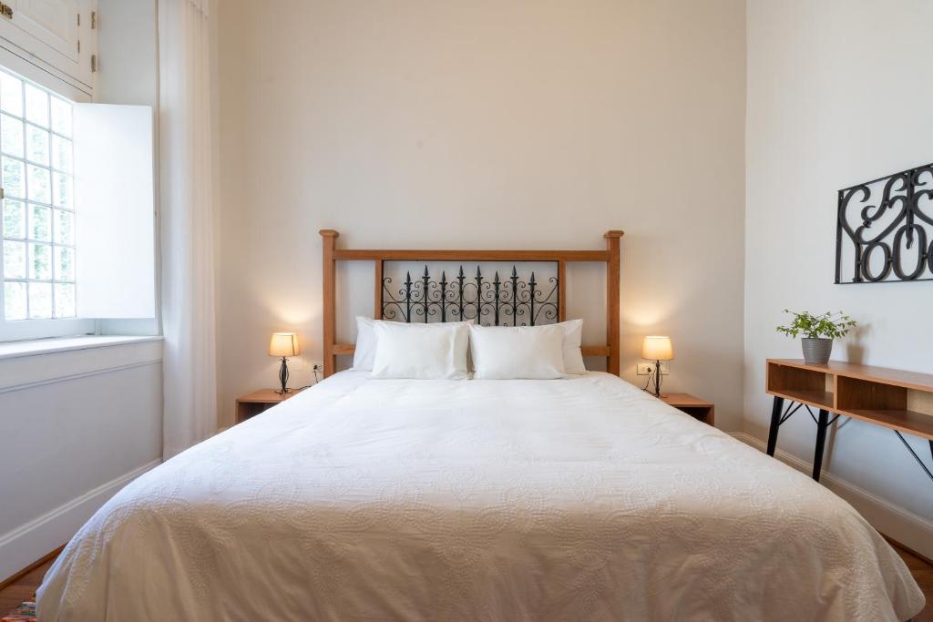 Postel nebo postele na pokoji v ubytování Casa Cáceres