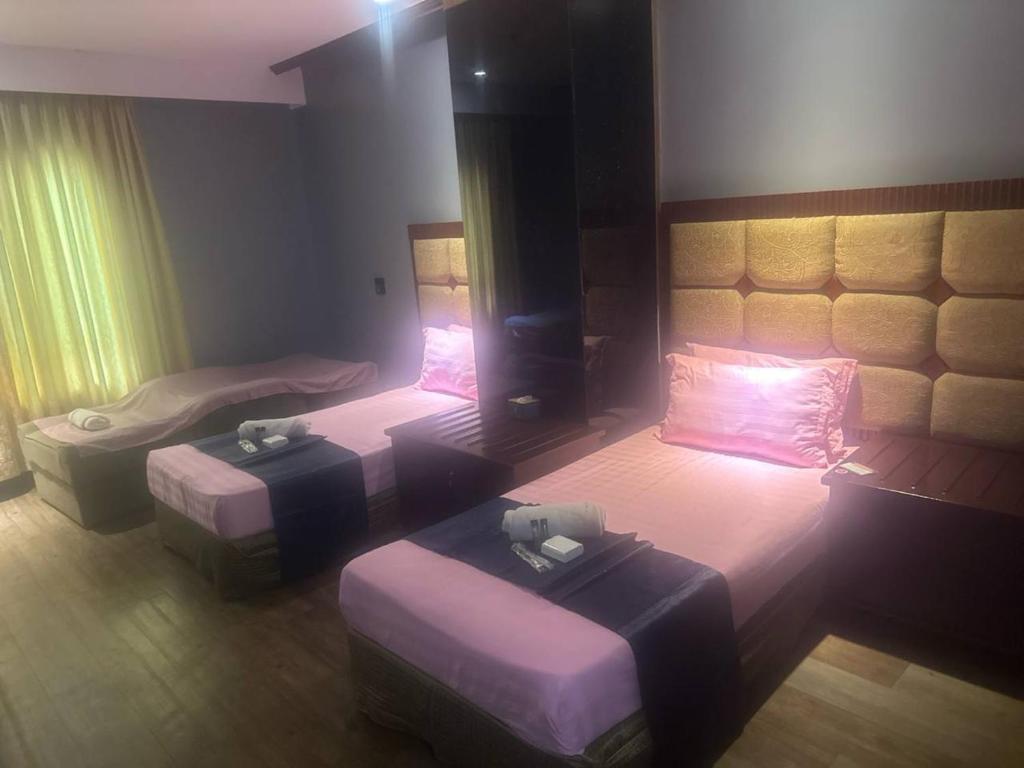 Postel nebo postele na pokoji v ubytování Jjimjbang hotel spa