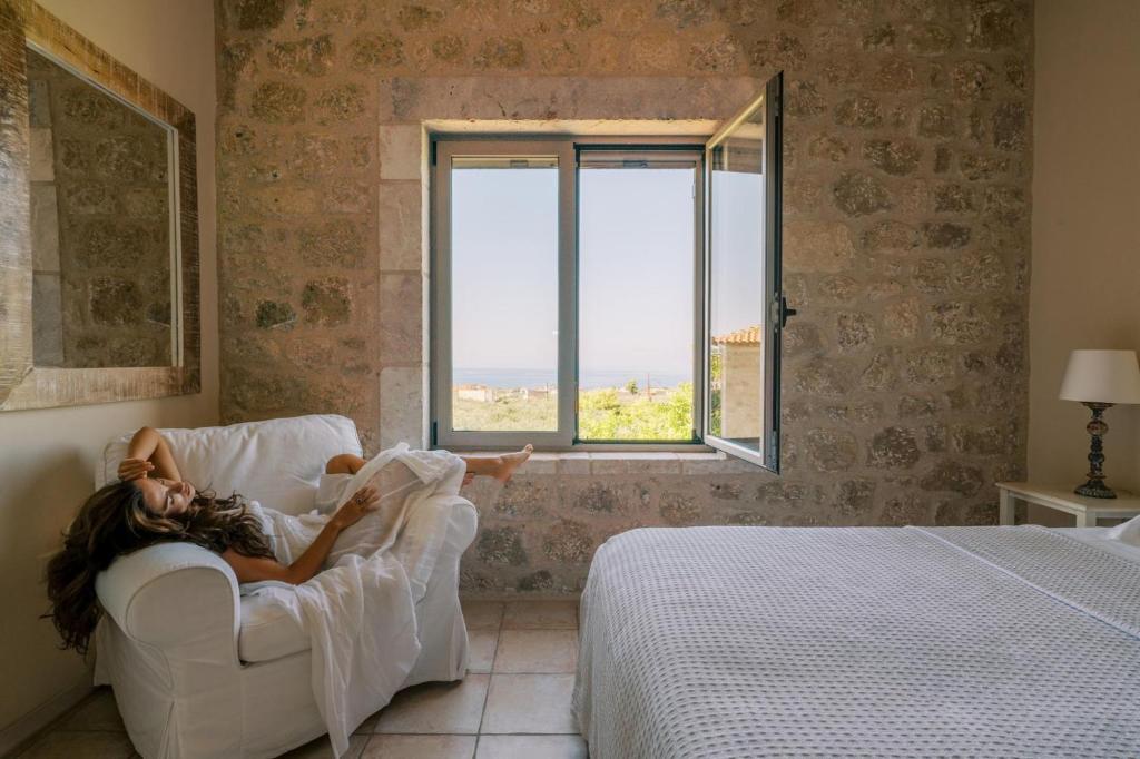 Postel nebo postele na pokoji v ubytování Riglia Villas - Villa Olive