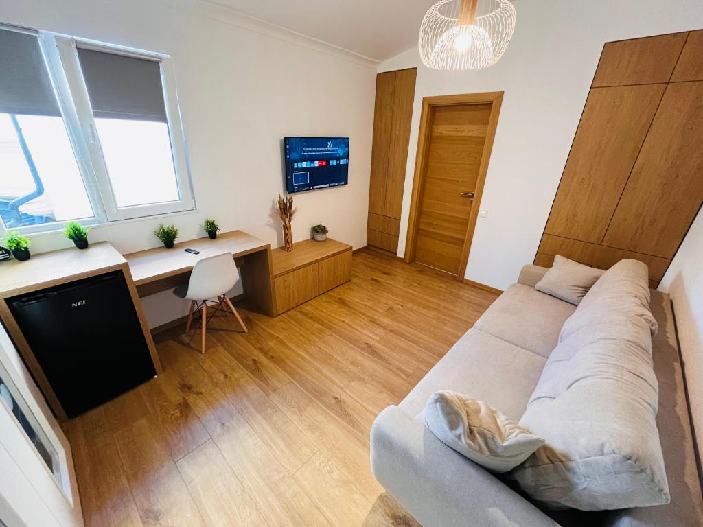 Postel nebo postele na pokoji v ubytování Moxa Residence