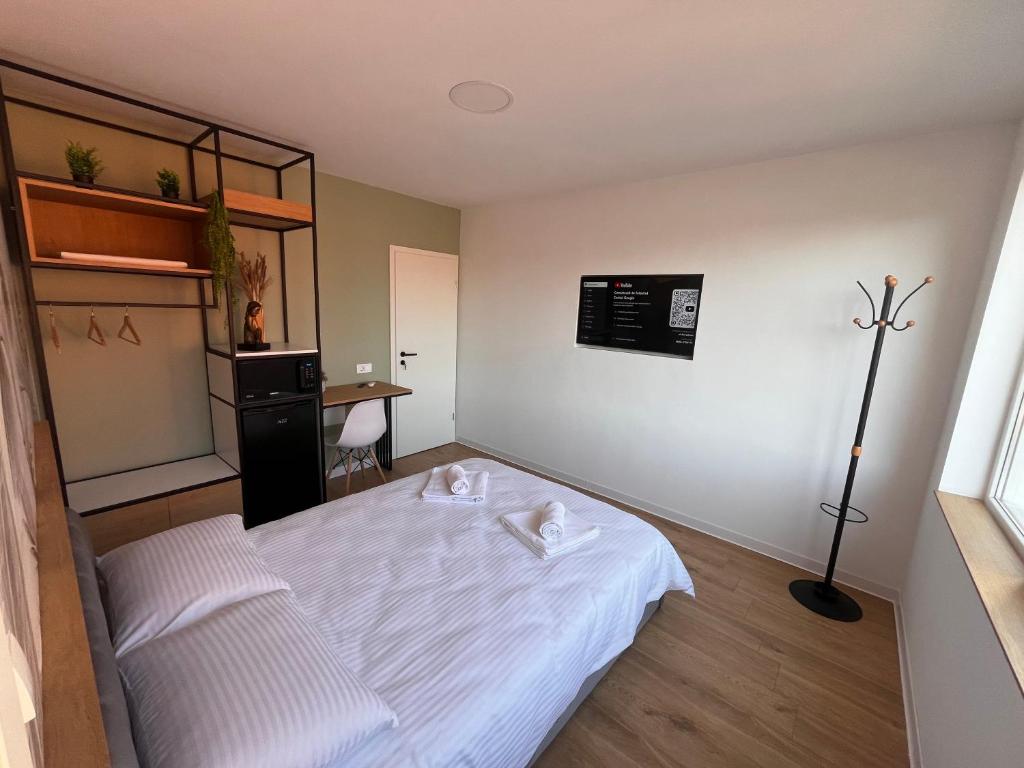 Postel nebo postele na pokoji v ubytování Moxa Residence
