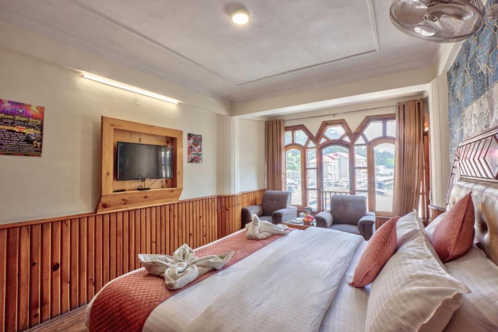 Postel nebo postele na pokoji v ubytování Hotel Ibex