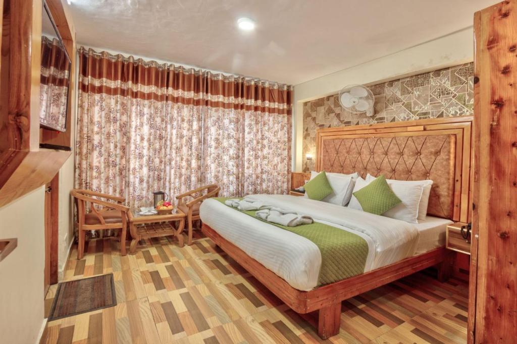 Postel nebo postele na pokoji v ubytování Hotel Ibex