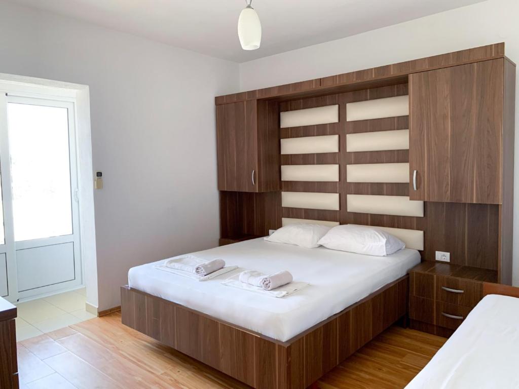Postel nebo postele na pokoji v ubytování Apartments Cobaj