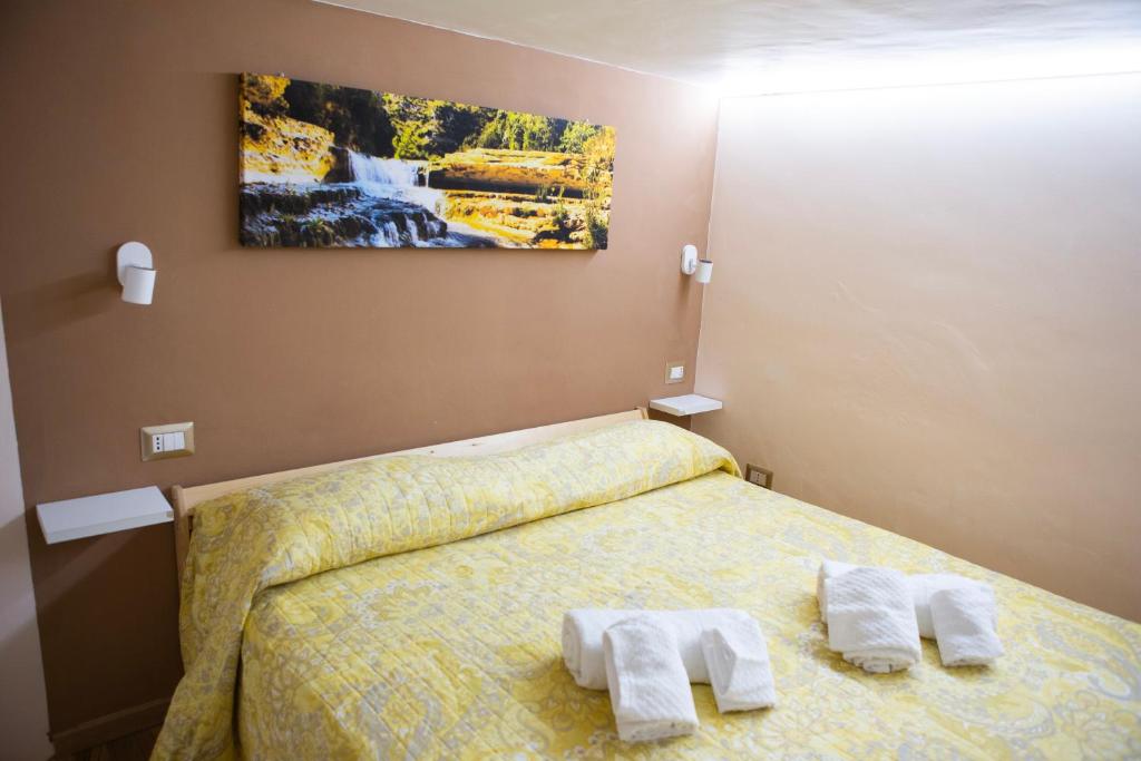 Postel nebo postele na pokoji v ubytování I VACANZIERI