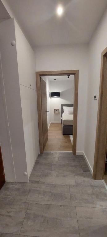 Posteľ alebo postele v izbe v ubytovaní Apartman Millá
