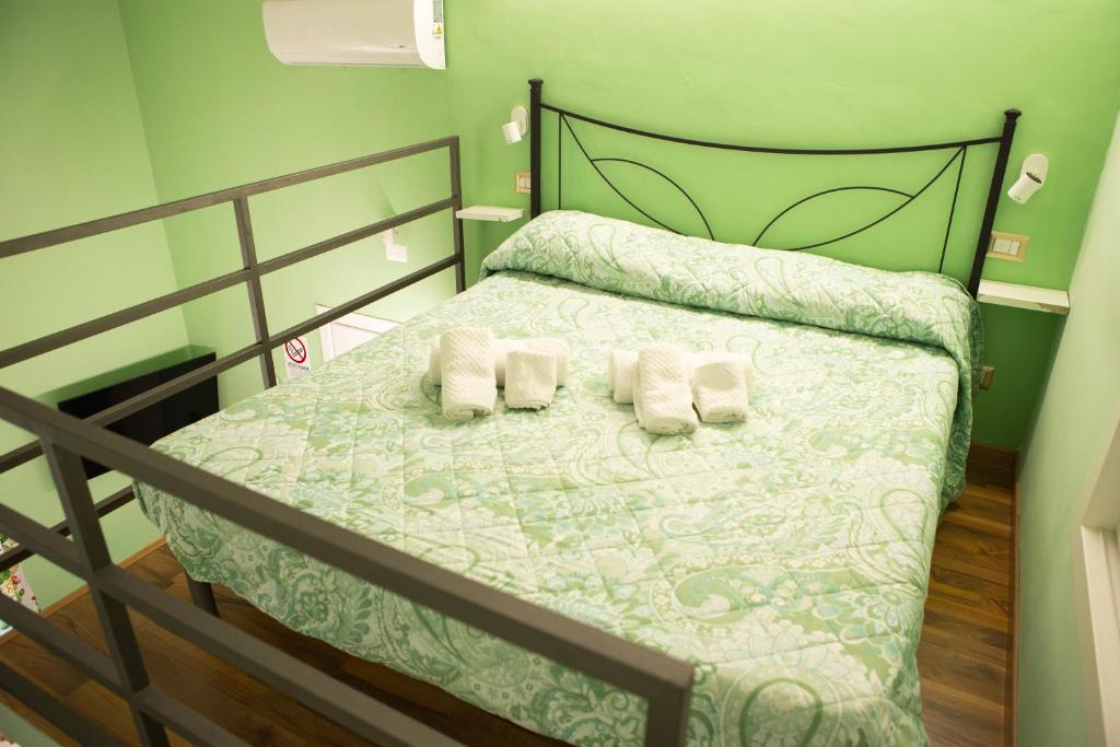 Postel nebo postele na pokoji v ubytování I VACANZIERI