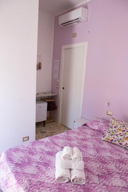 Postel nebo postele na pokoji v ubytování I VACANZIERI