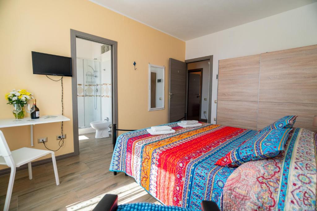 Postel nebo postele na pokoji v ubytování Casa Yvona