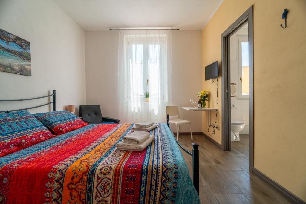 Postel nebo postele na pokoji v ubytování Casa Yvona