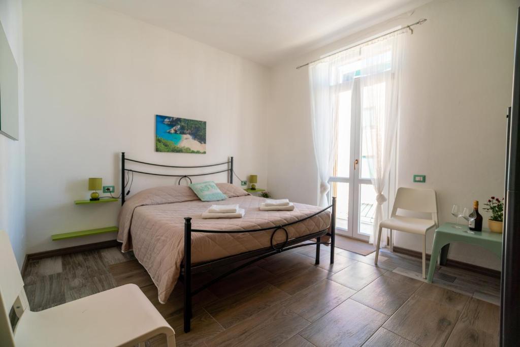 Postel nebo postele na pokoji v ubytování Casa Yvona