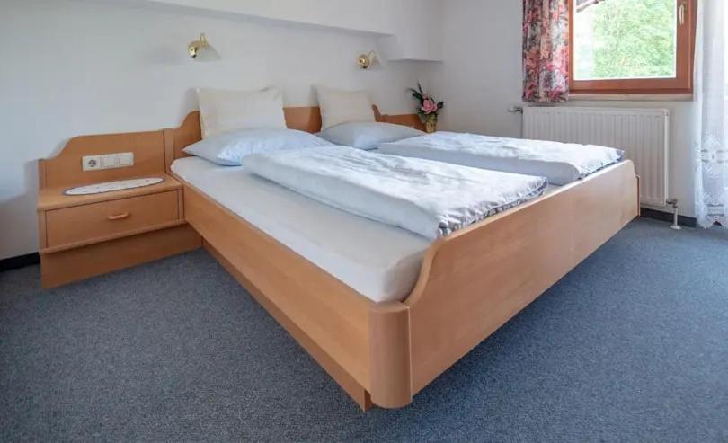 Letto o letti in una camera di Haus Petersmann
