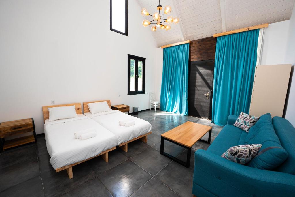 Postel nebo postele na pokoji v ubytování Vagabond - Cozy Guesthouse in Lagodekhi