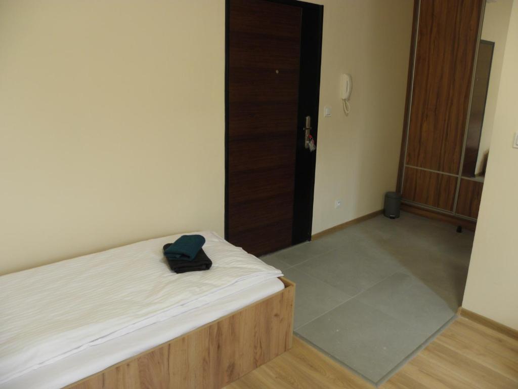 Postel nebo postele na pokoji v ubytování Anieli Krzywoń