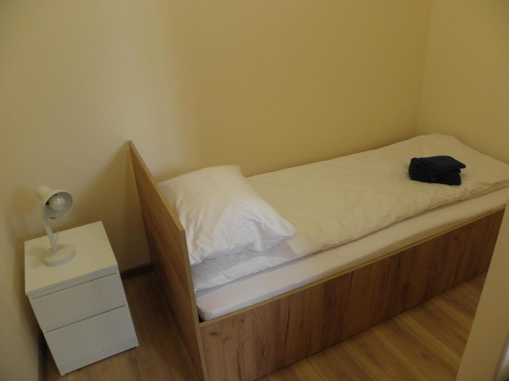 Postel nebo postele na pokoji v ubytování Anieli Krzywoń