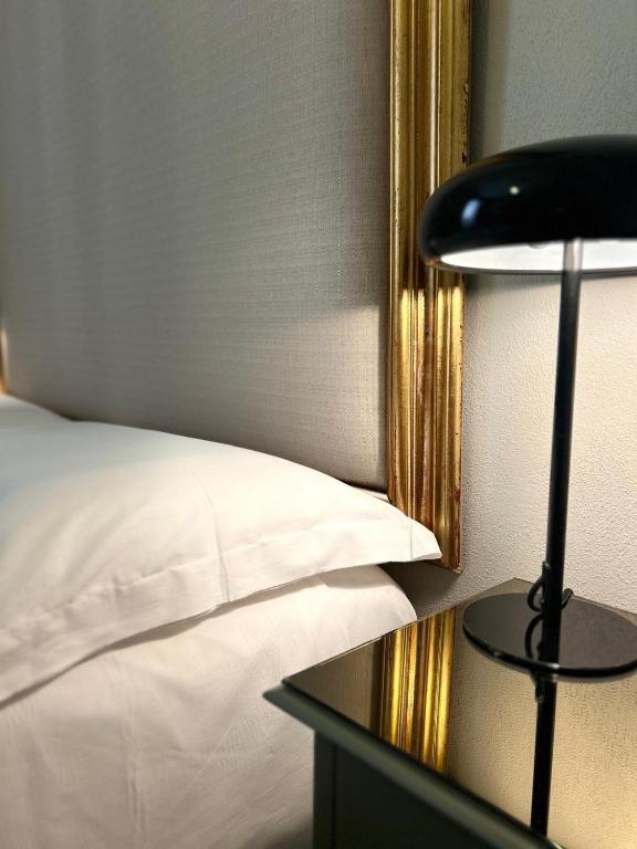 Postel nebo postele na pokoji v ubytování NOTUS Rooms Adults Only