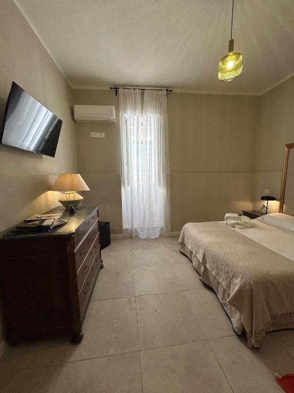Postel nebo postele na pokoji v ubytování NOTUS Rooms Adults Only