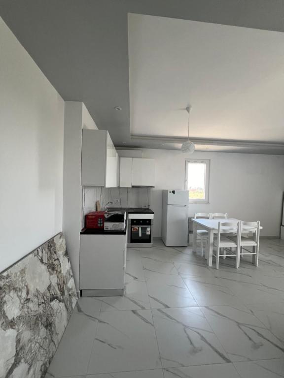 Kuchyň nebo kuchyňský kout v ubytování Suli Beach Apartments