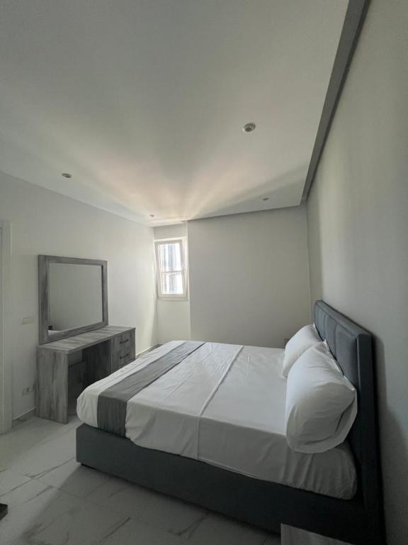 Postel nebo postele na pokoji v ubytování Suli Beach Apartments