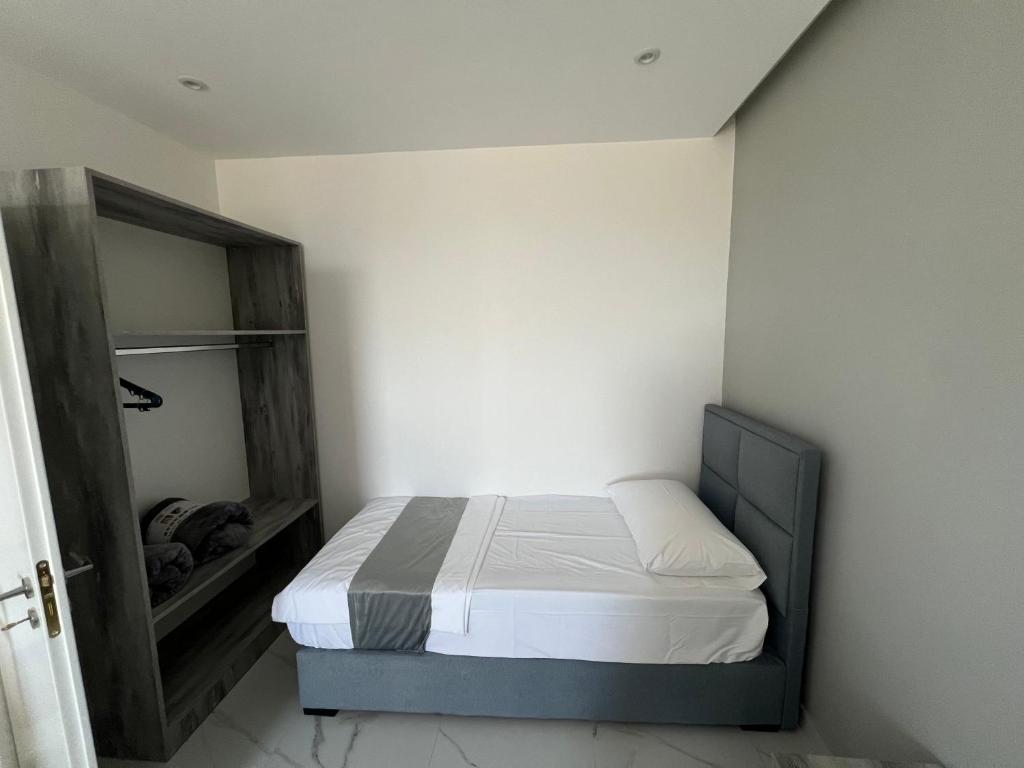 Postel nebo postele na pokoji v ubytování Suli Beach Apartments