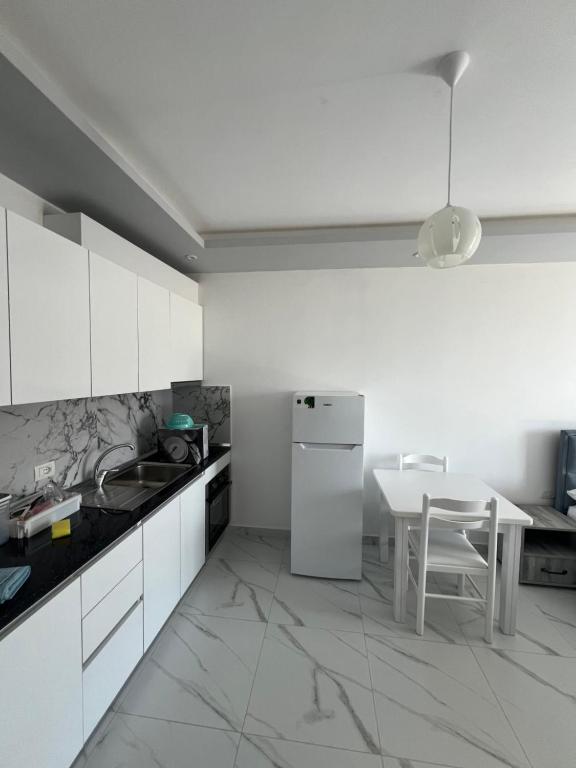 Kuchyň nebo kuchyňský kout v ubytování Suli Beach Apartments