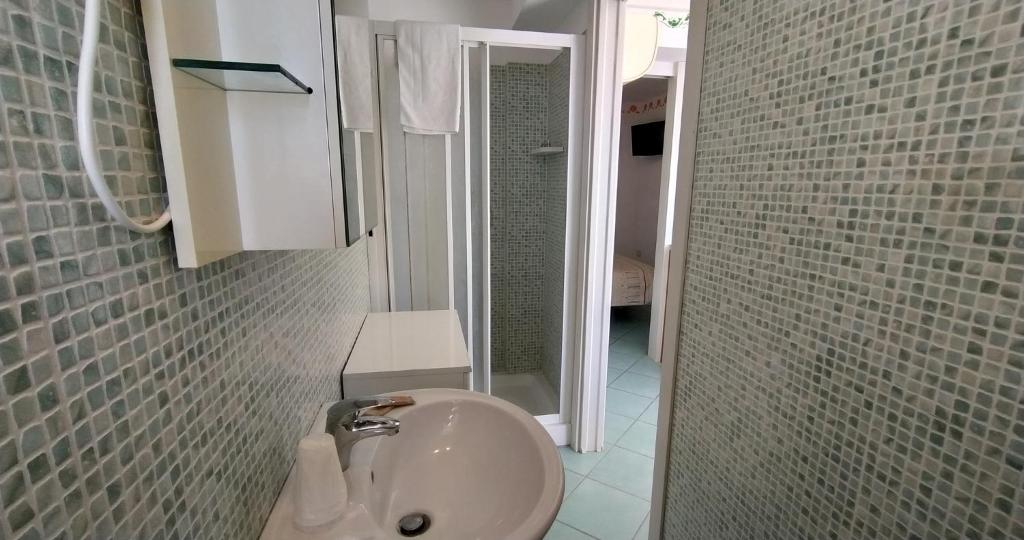 Koupelna v ubytování Hotel Residence Arturo
