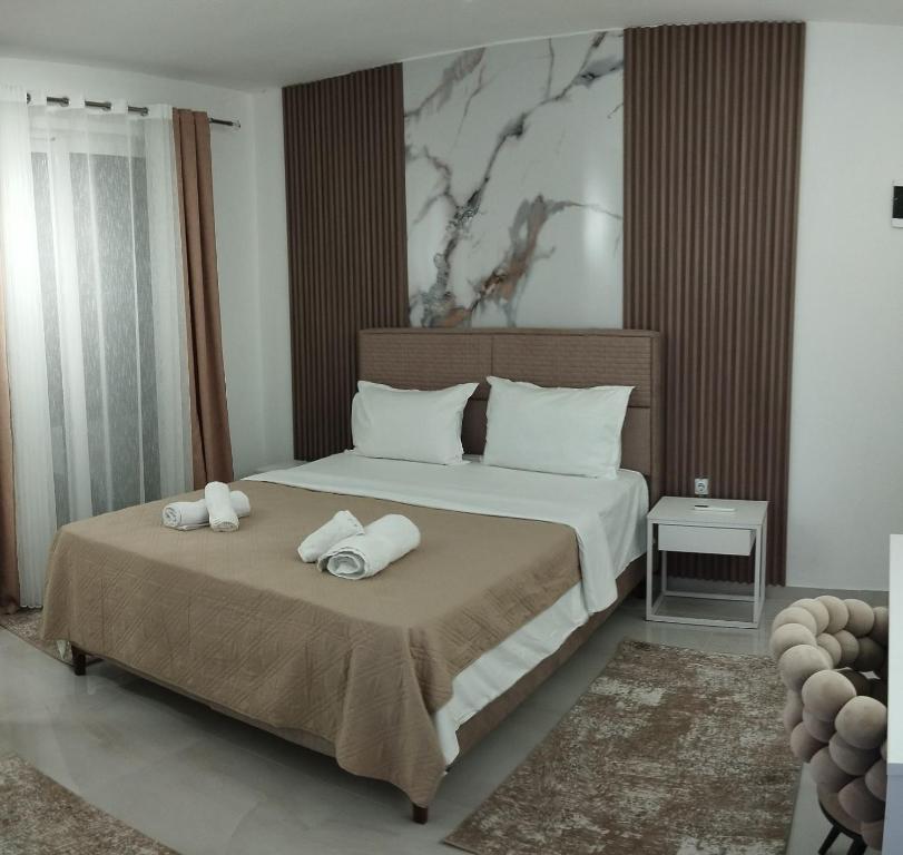 Postel nebo postele na pokoji v ubytování Kahari Apartments