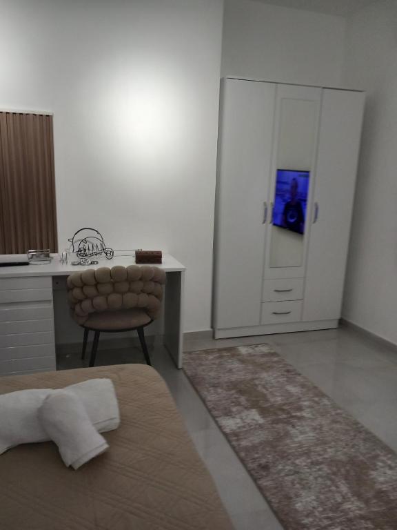 Postel nebo postele na pokoji v ubytování Kahari Apartments