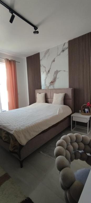 Postel nebo postele na pokoji v ubytování Kahari Apartments