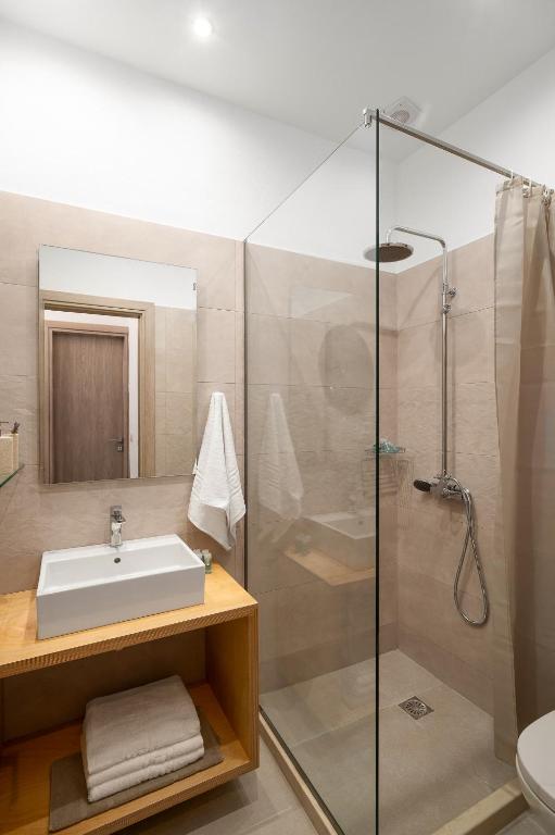 Koupelna v ubytování Papadia Luxury Apartments