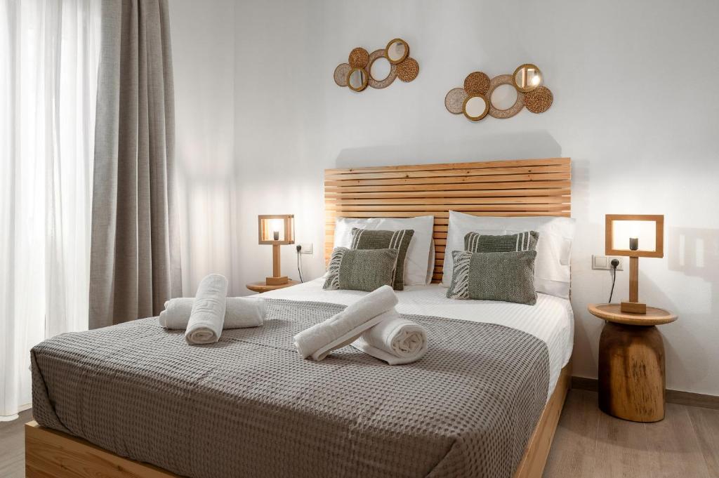 Postel nebo postele na pokoji v ubytování Papadia Luxury Apartments
