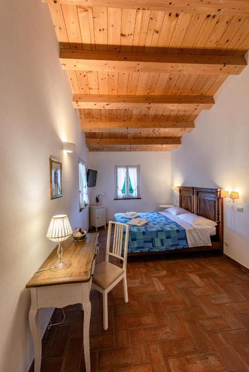 Postel nebo postele na pokoji v ubytování La Visciola - Country House del Conero