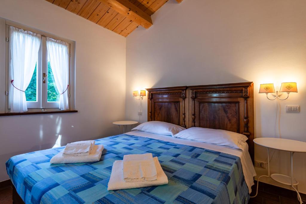 Postel nebo postele na pokoji v ubytování La Visciola - Country House del Conero