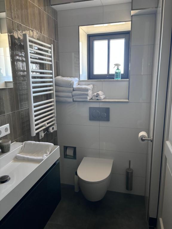 Koupelna v ubytování B&B In de duinen