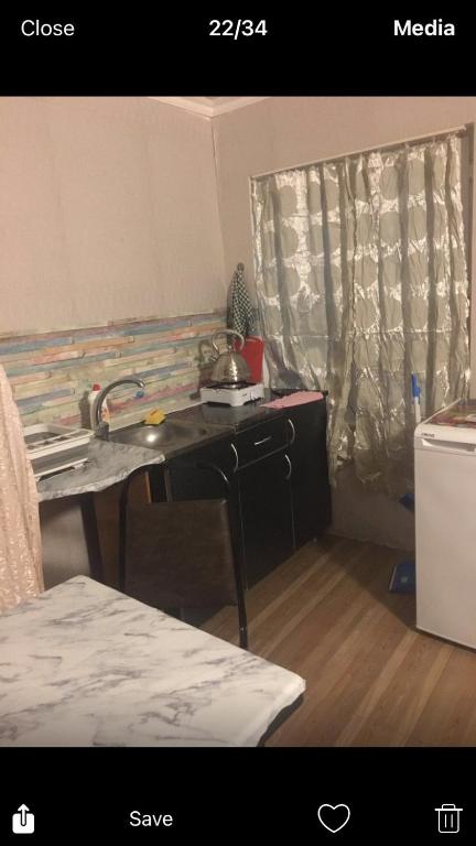 Postel nebo postele na pokoji v ubytování Lux-2-or-1- persons Irodion Evdoshvili Street #15