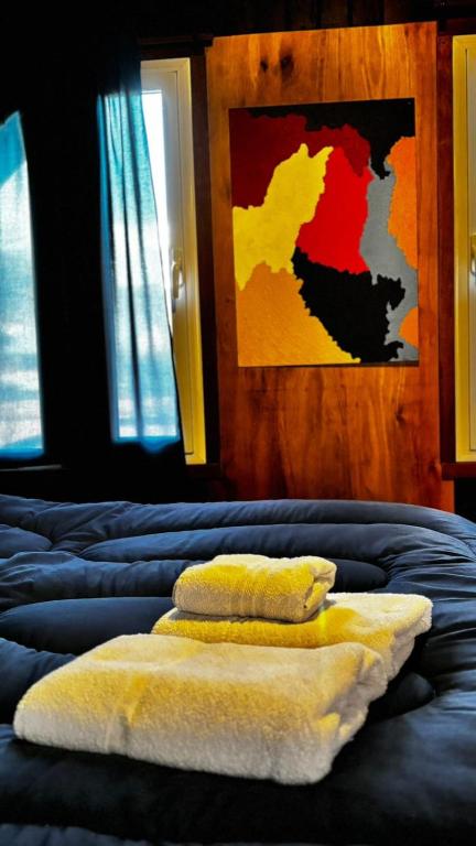 Postel nebo postele na pokoji v ubytování Alaska Patagonia Hostel