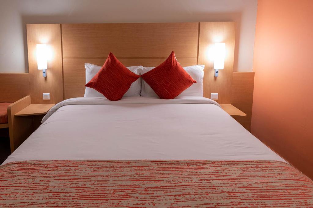 Postel nebo postele na pokoji v ubytování Hôtel La Perle de Mogador
