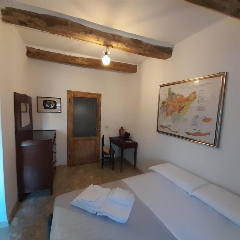 Postel nebo postele na pokoji v ubytování Casetta del Poio