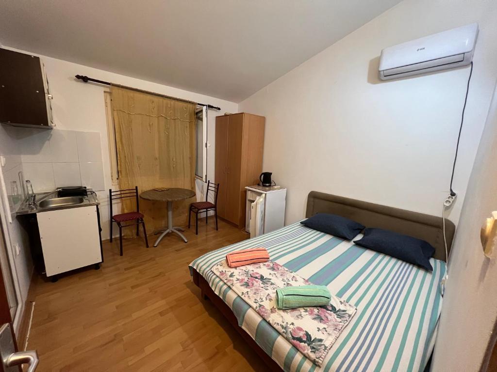 Postel nebo postele na pokoji v ubytování Green Villa