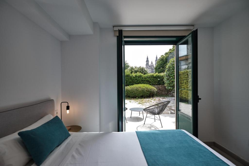 Postel nebo postele na pokoji v ubytování Hotel Pombal Rooms
