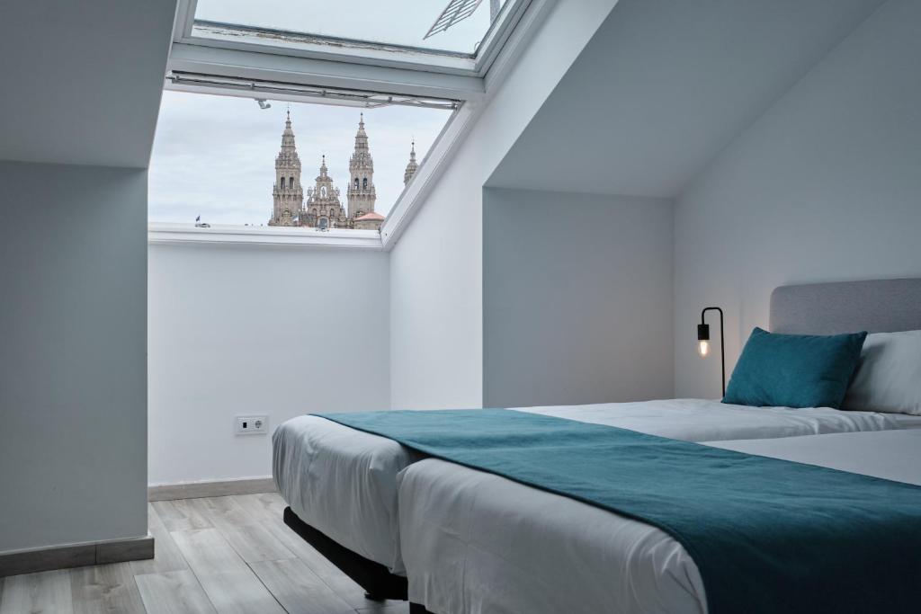 Postel nebo postele na pokoji v ubytování Hotel Pombal Rooms