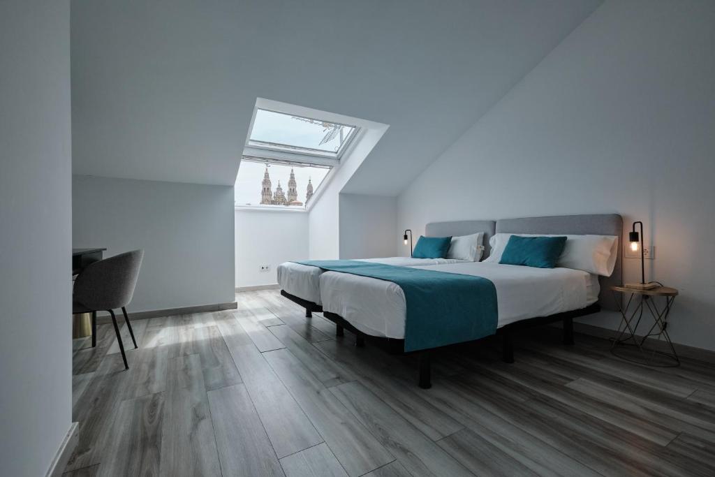 Postel nebo postele na pokoji v ubytování Hotel Pombal Rooms